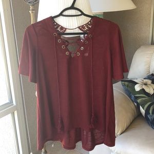 Never worn Burgundy top with lace in back